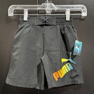 Puma Elastic Waist,mesh panty lined, back pocket logo graphic swim trunk